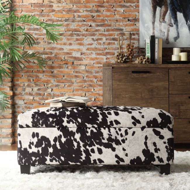 Cow hide ottoman for storage